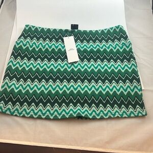 Urban Outfitters - different shades of green mini skirt. Size Small NWT